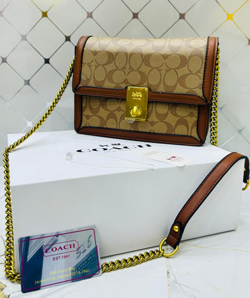COACH HUTTON SHOULDER BAG WITH SIGNATURE CANVAS